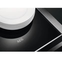 AEG KDK911424T 14cm Warming Drawer - Matt Black 14 AEG KDK911424T 14cm Warming Drawer - Matt Black -Kitchen Sale Shop aeg kdk911424m plates on base top view 1