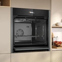 Neff N70 B54CR31G0B Bulit In Single Slide & Hide Electric Oven With Home Connect - Black With Graphite Grey Trim -Kitchen Sale Shop n e neff n70 b54cr31g0b slide and hide electric oven lifestyle2