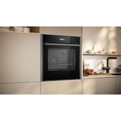 Neff N70 B54CR31G0B Bulit In Single Slide & Hide Electric Oven With Home Connect - Black With Graphite Grey Trim -Kitchen Sale Shop n e neff n70 b54cr31g0b slide and hide electric oven lifestyle4