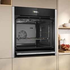 Neff N70 B54CR31N0B Bulit In Single Slide & Hide Electric Oven With Home Connect - Black With Steel Trim -Kitchen Sale Shop n e neff n70 b54cr31n0b slide and hide electric oven lifestyle3