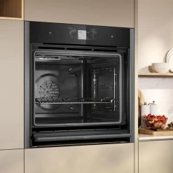 Neff N90 B64VT73G0B Bulit In Single Slide & Hide Pyrolytic Oven With Added Steam & Home Connect - Black With Graphite Grey Trim -Kitchen Sale Shop n e neff n90 b64vt73g0b slide and hide pyrolytic oven lifestyle3
