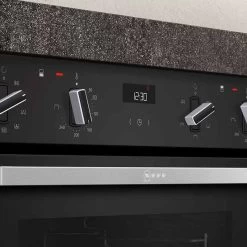 Neff N50 J1ACE2HN0B Built-Under Double Electric Oven - Stainless Steel -Kitchen Sale Shop neff n50j1ace2hn0b digital display and controls panel close up view